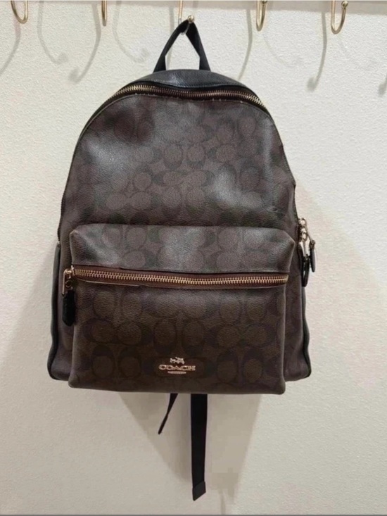 Coach Handbags - COACH Charlie Backpack - Dark Brown
Signature Canvas F32200